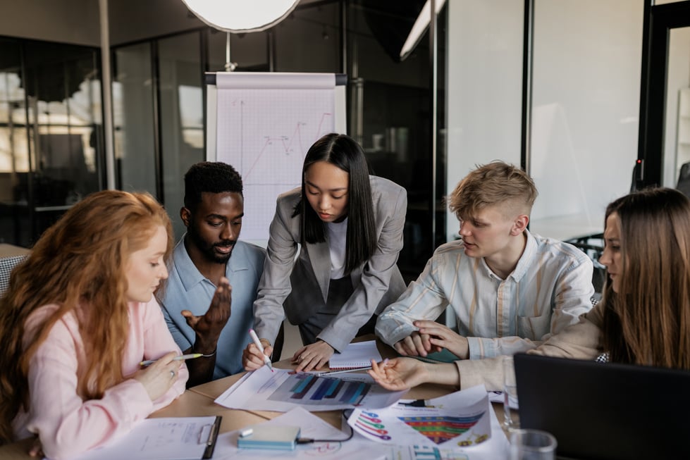 Photo of Employees Brainstorming Together